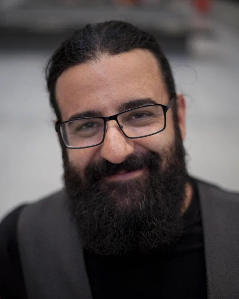 Marc Gelpí smiling during a conversation